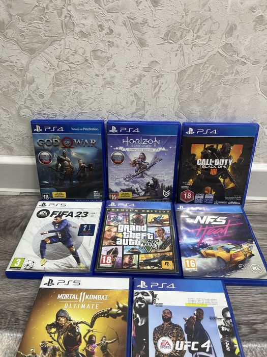 PlayStation 5 + 2 джойстика + 7 игр