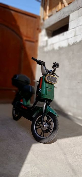 скутер  холати идеал