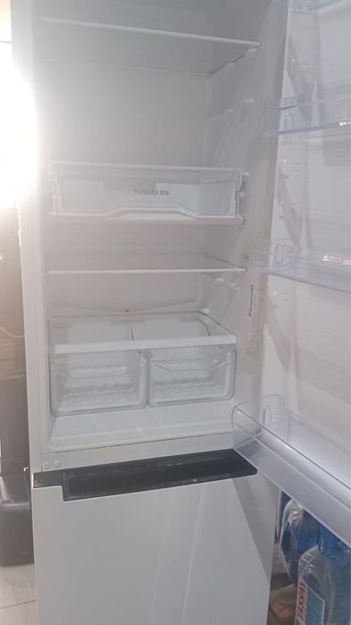 Холодильник почим новый