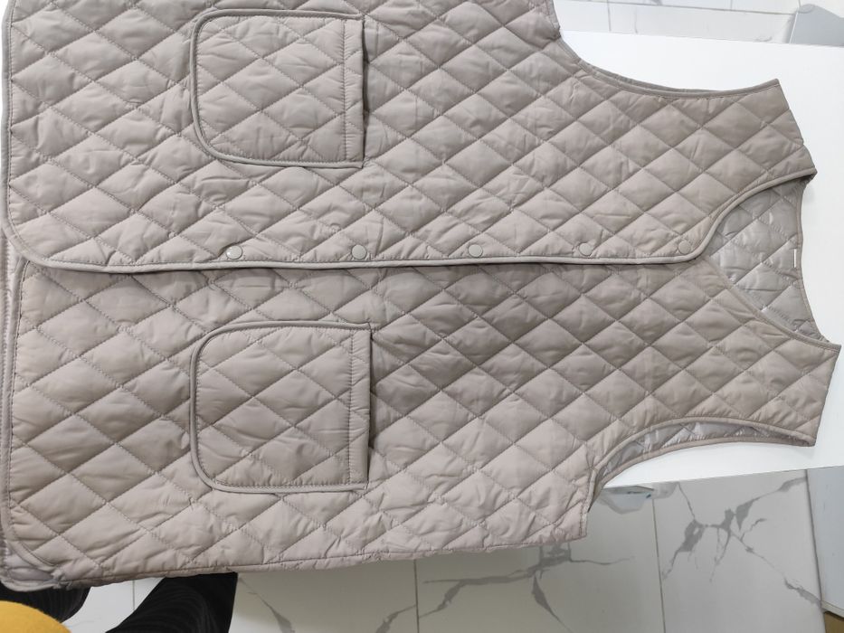 Продам жилетку новую