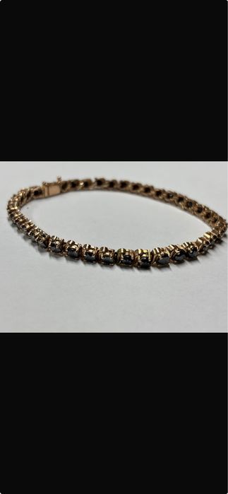Brățara de  aur cu diamante negre