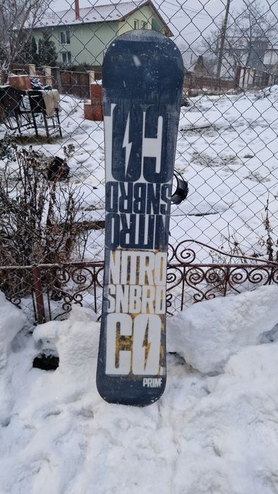 Placă snowboard Nitro + legături Flow (prindere rapidă)