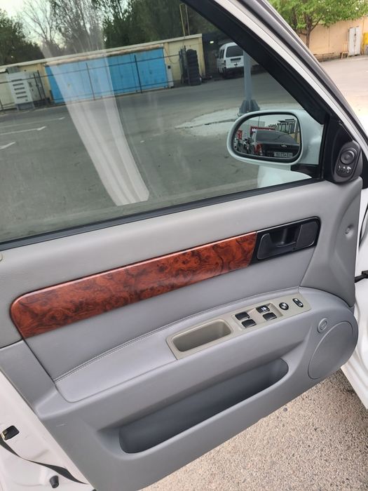 Lasetti 2004 yil 59000 km yurgan kiraska toza  moshina ideal