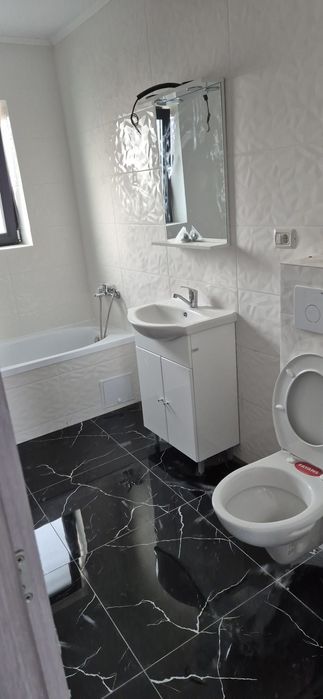 Casa  Ciurbesti cu scara interioara si  placa de beton !