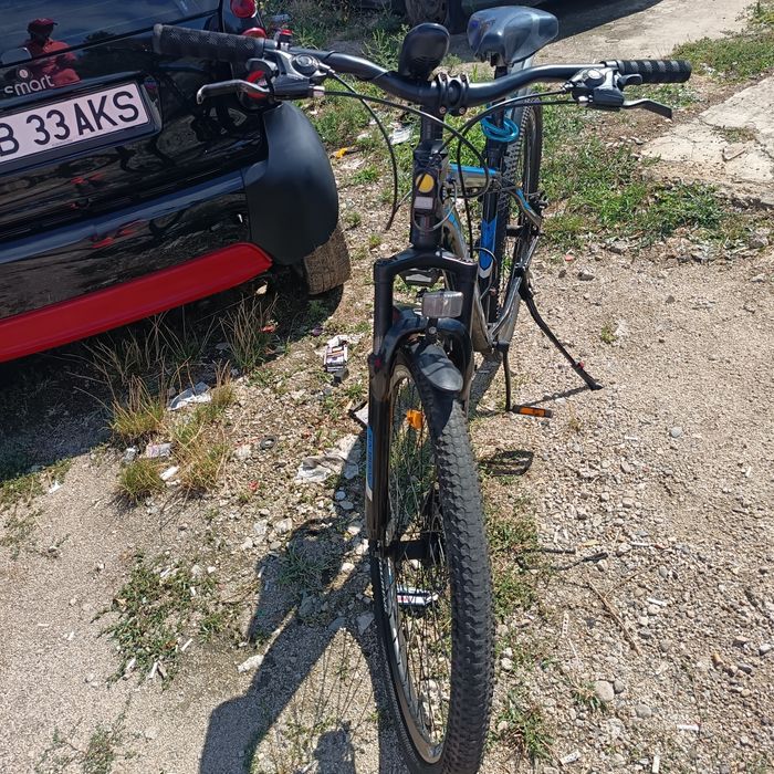 Bicicleta aproape noua