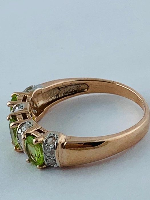 Redus  Inel aur 14 kcu peridot și diamante