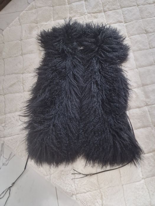 Vesta blana miel mongolez