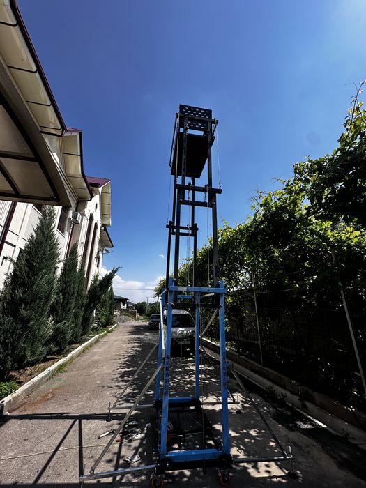 Elektironi lesa lift eskalator
