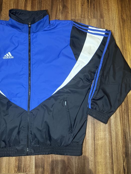 ADIDAS 90s retro windbreaker for men in blue and black colour.