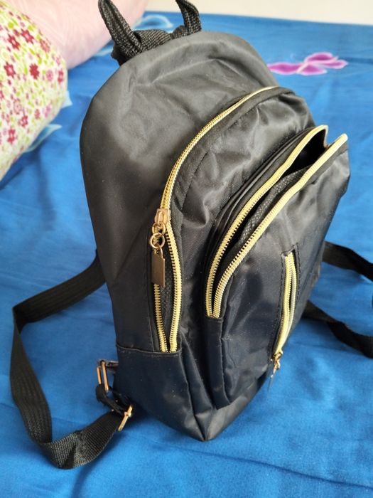 Rucsac chic încăpător și practic