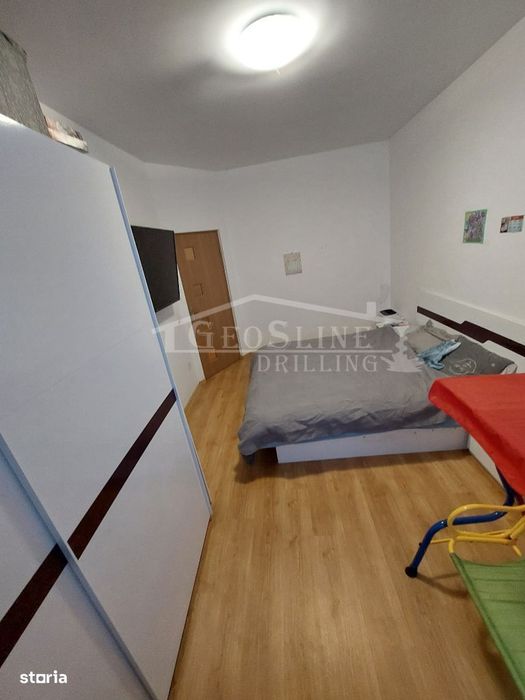 Apartament 2 dormitoare 1 Open-space Parcare privată extra