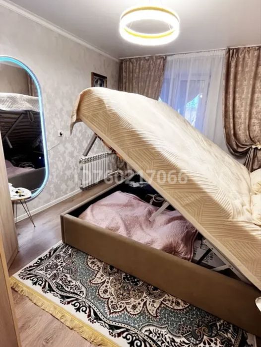 Кровать с механизмом