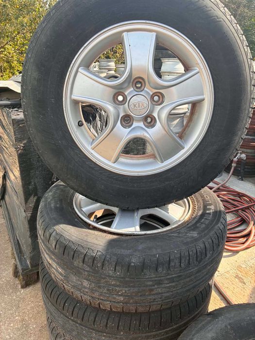 4 броя гуми с джанти за KIA Sportage 215/70 R15