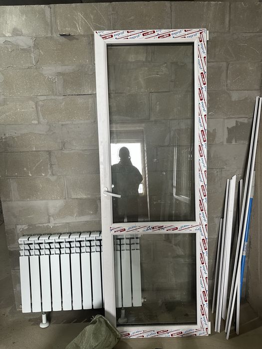 Окно балконное пластиковое