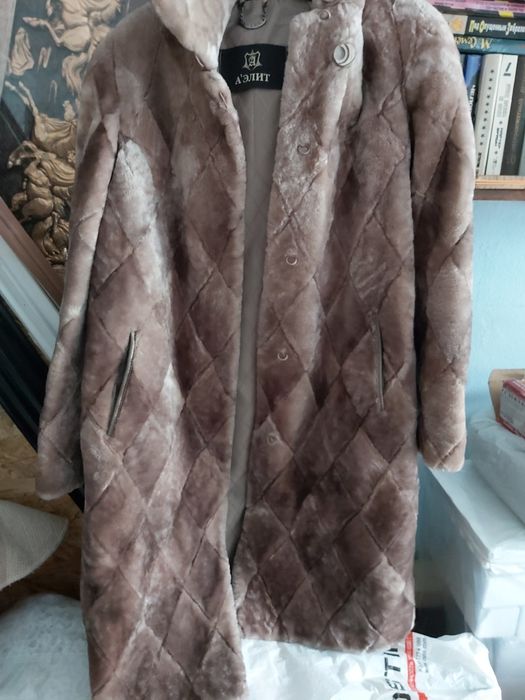 Продам жён.пуховик и шубы