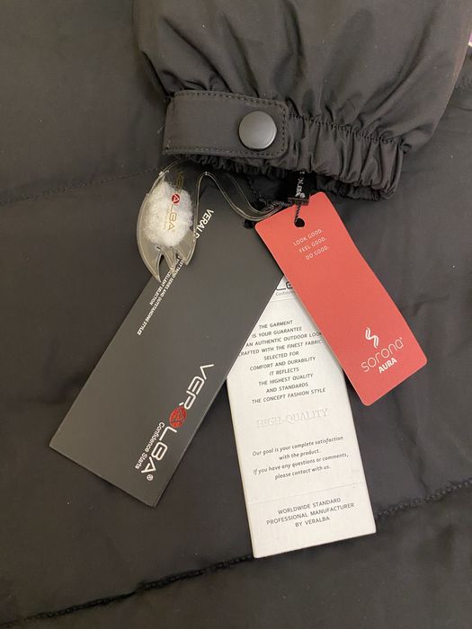 Пуховик новый 50-52размер