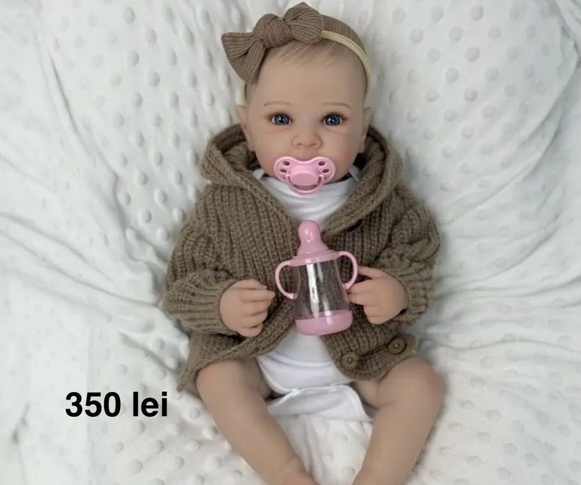 Papusa Reborn bebelus realist cu corp silicon textil marsupiu carut