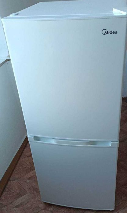 Продам современный , рабочий  холодильник