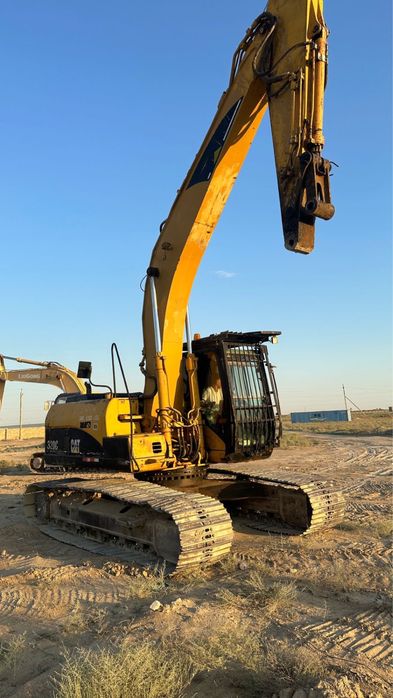 Аренда Экскаватор Cat 320
