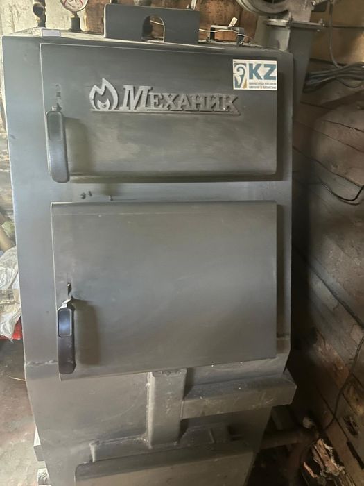 Котел длительного горения Механик