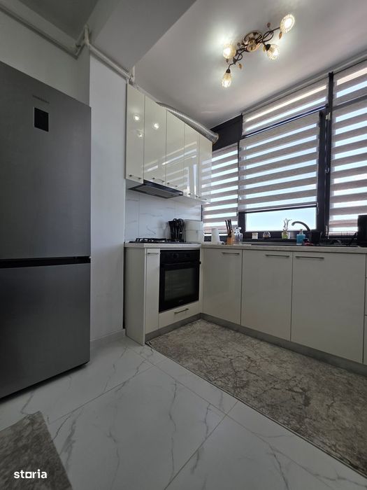 Apartament in bloc nou,mobilat, parcare proprie.