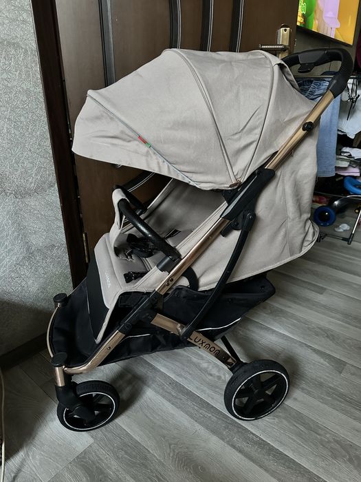 Продам детскую коляску Luxmom