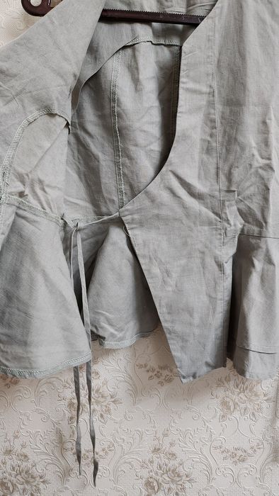 Оливковая жилетка