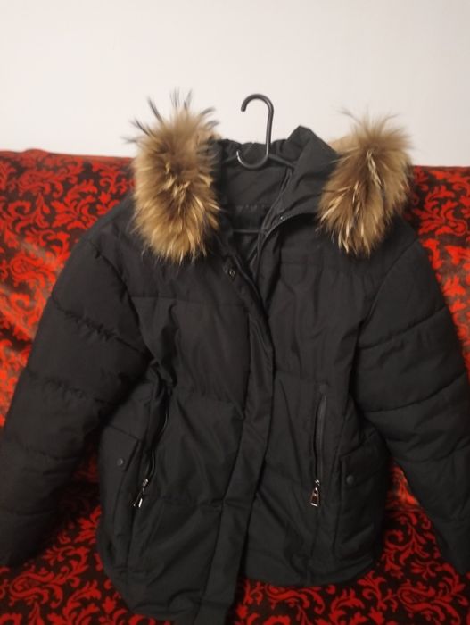 Продам пуховик женский