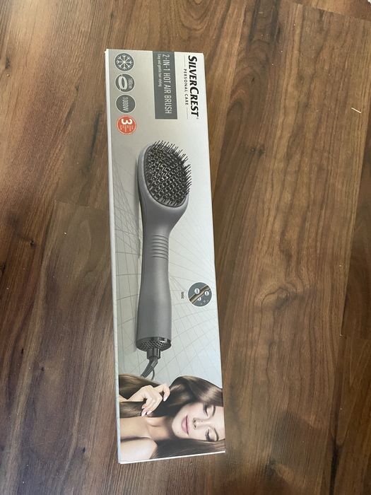 Четка за коса с топъл въздух