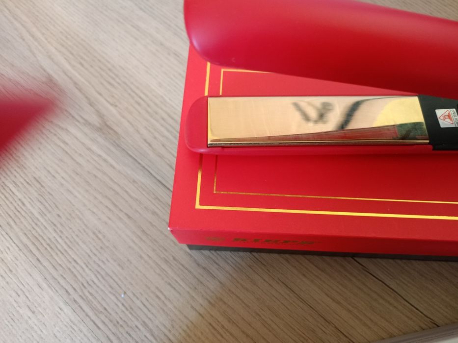 Преса за коса изправяне