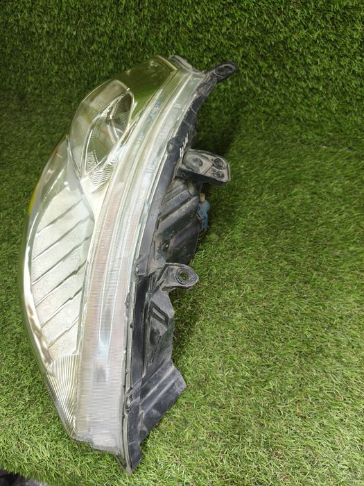 Фара nissan tiida c11