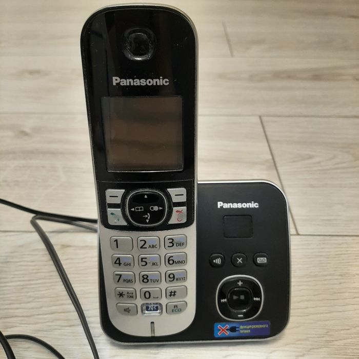 Телефон Panasonic со станцией