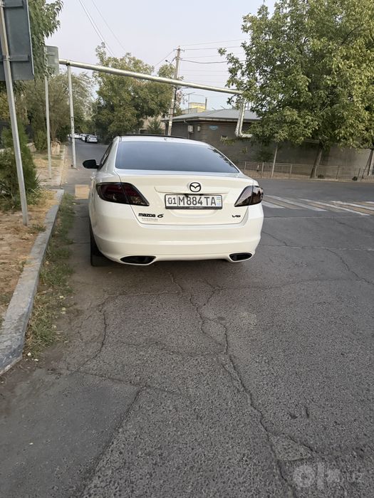 Mazda 6  америанка двиг 3,7 л. 277 л.с. Цвет белый.  Привод передний .