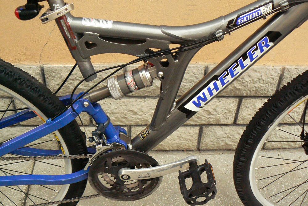 Bicicleta mountain bike de copii full suspensie Wheeler 26