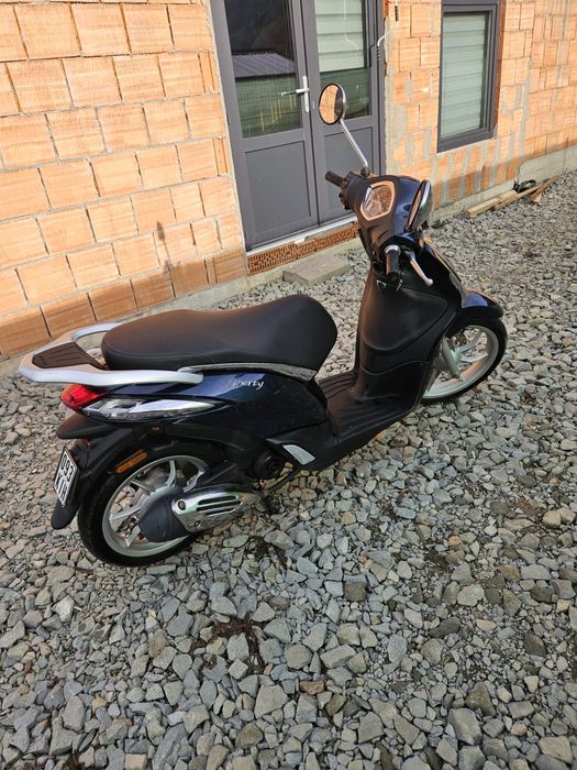 Vand scuter , cu km putini