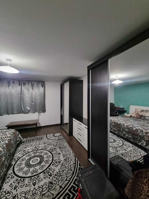 Casă cu Panouri Fotovoltaice si Teren 670 mp