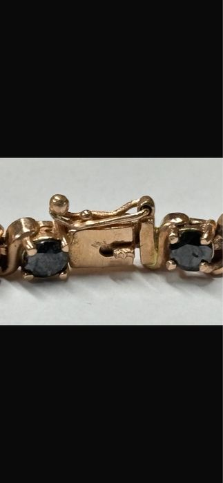 Brățara de  aur cu diamante negre