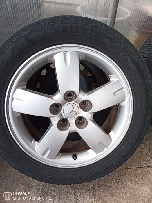 Джанти с гуми и гайки за Мицубиши аутлендур 17 цола