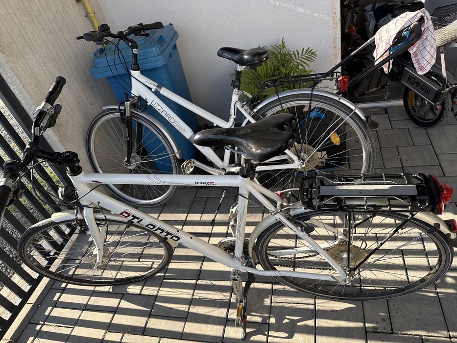 Vind  set doua biciclete  una de barbati si una de femei
