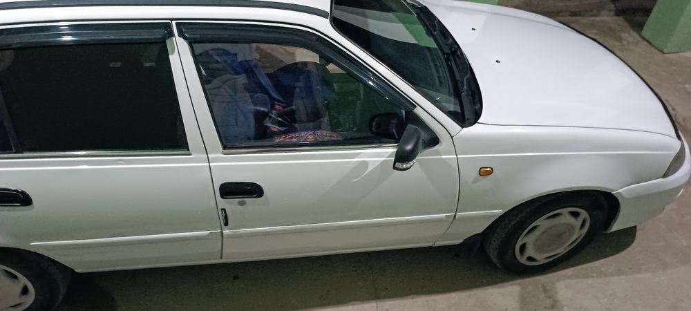 Nexia 2  gibrid mator 2012 yil probeg 343ming km metan 3500$