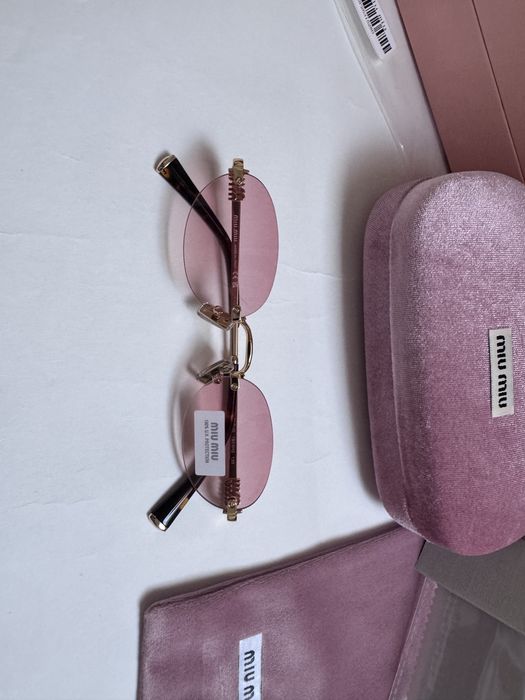 Ochelari de soare Miu Miu Oval-Rimless SMUA54 51-20 140, Noi