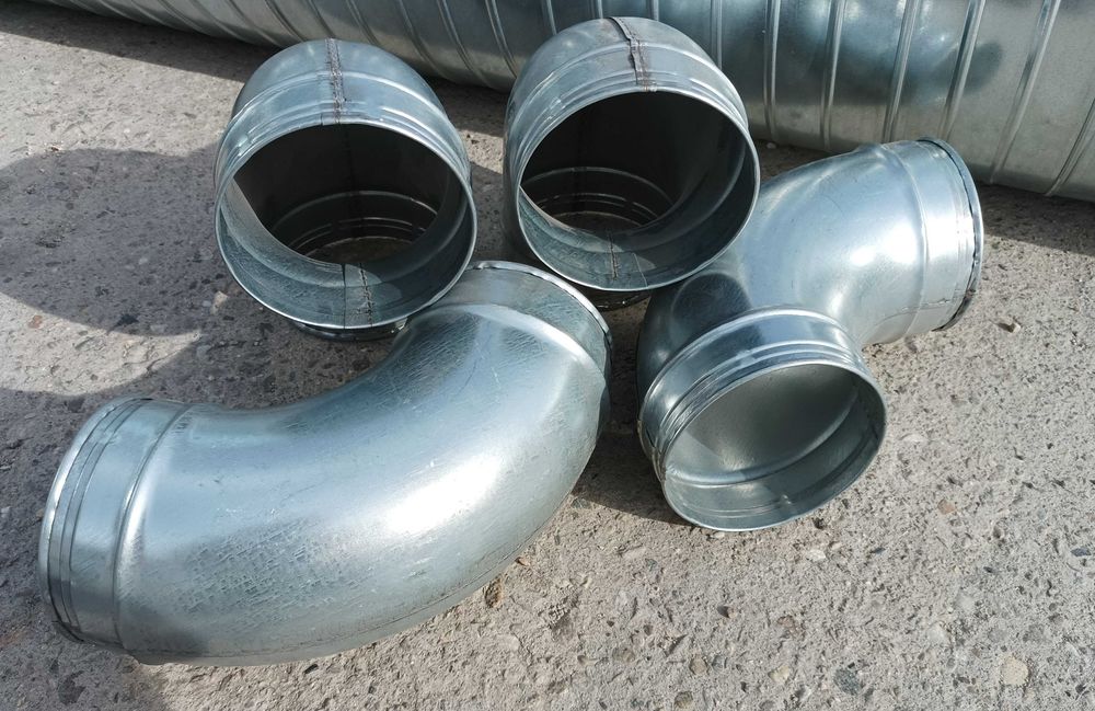 Коляно за аспирация ф125 поцинкована ламарина