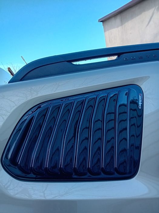 Ornamente / Protecții Geam Spate Dacia Duster 2