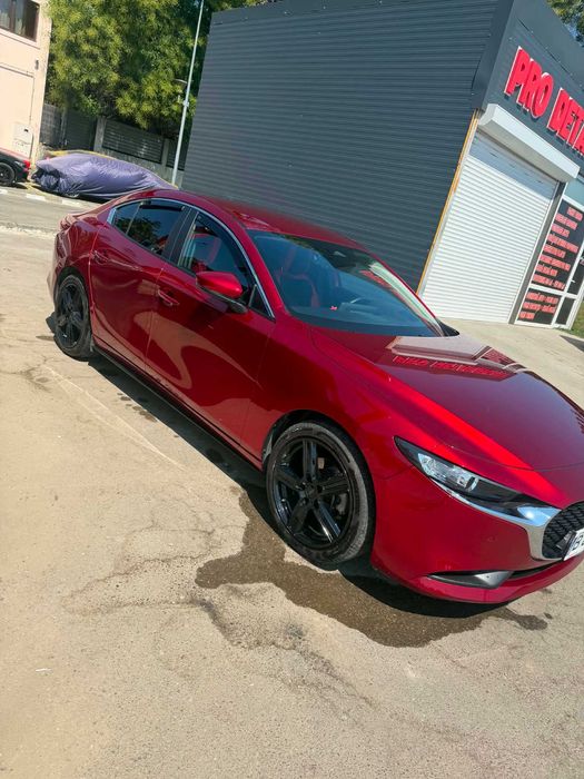 Mazda 3 sedan soul red