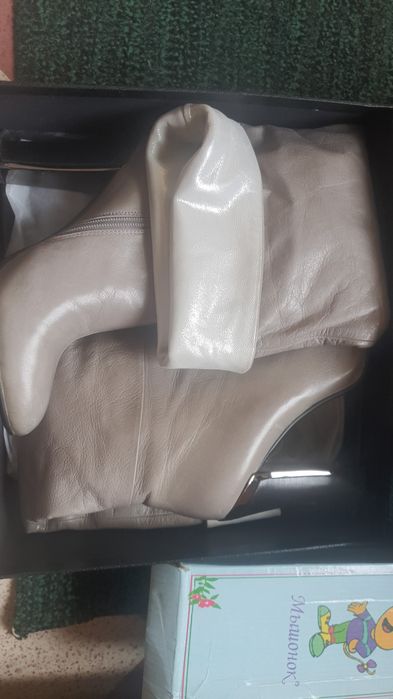 Новые кожанные сапоги