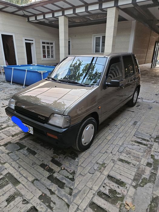 2000 йил тико тозз