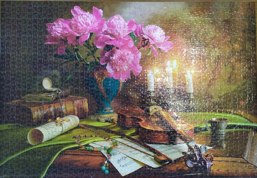 Продам пазлы (собранные)