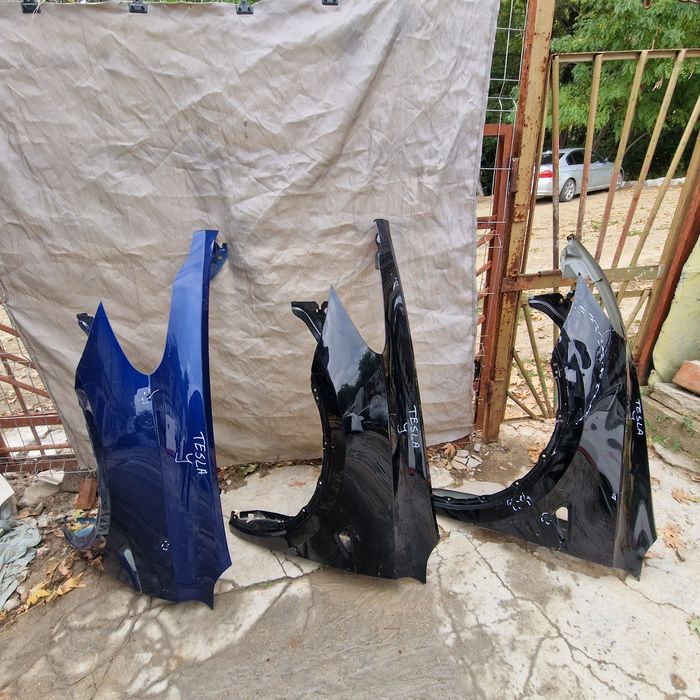 Tesla Y ляв калник