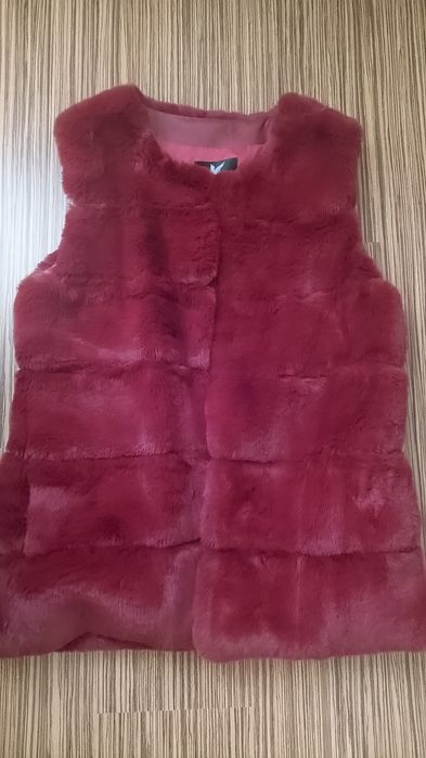 Vestă damă nouă.