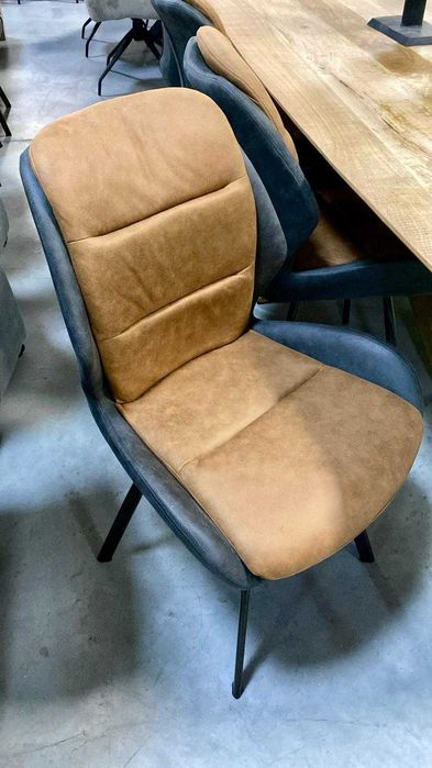 Scaun tip fotoliu  tapitat in doua nuante ,piele intoarsa